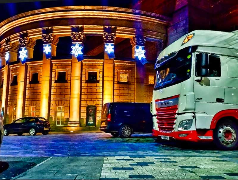 NVL lorry outside venue at night